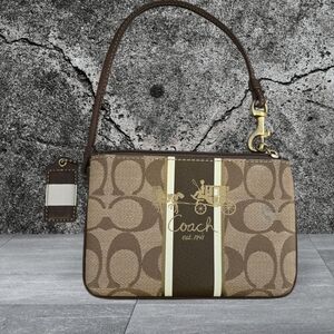 Coach Signature Brown and Tan Wristlet With Hangtag
